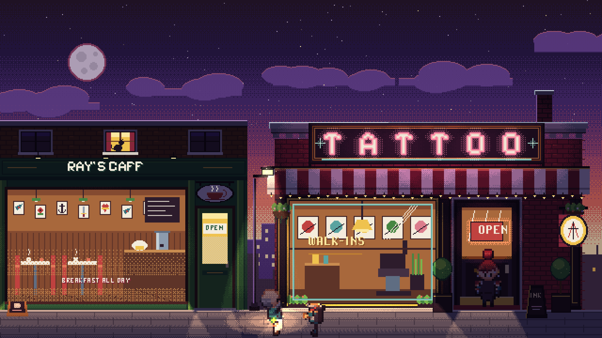 Night street: the tattoo studio's neon sign lit beside Ray's Caff
